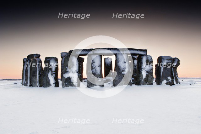 Stonehenge, Wiltshire, in the snow, c2015. Artist: James O Davies.