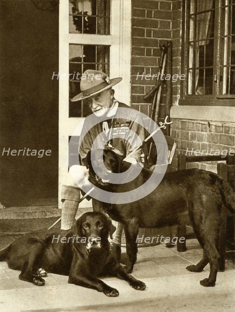 Robert Baden-Powell at home with his dogs, c1929, (1935). Creator: Unknown.