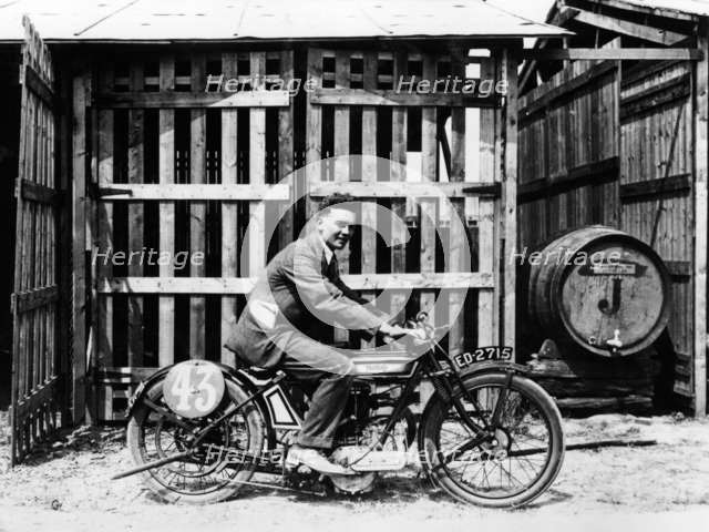 Billy Hollowell on a Norton OHV motorbike, 1922. Artist: Unknown