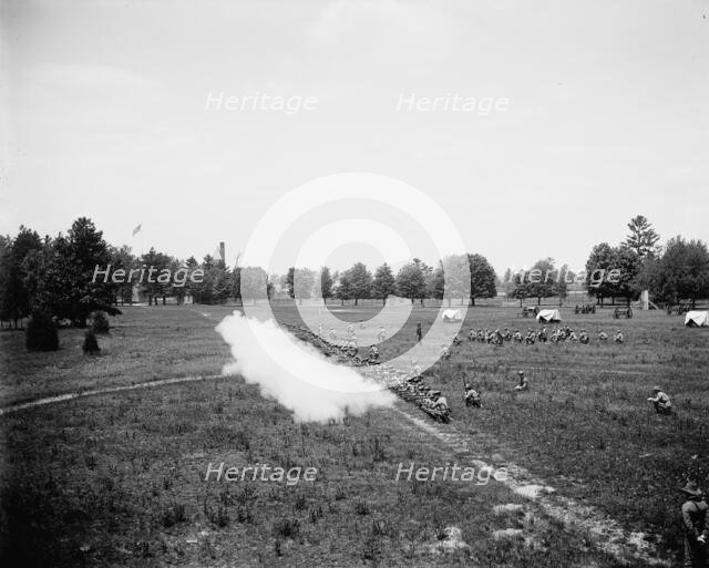 Battalion firing, kneeling, M[ichigan] M[ilitary] A[cademy], Orchard Lake, Michigan, c1900. Creator: Unknown.