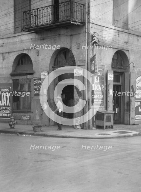Exterior of Court House Grocer, New Orleans, between 1920 and 1926. Creator: Arnold Genthe.