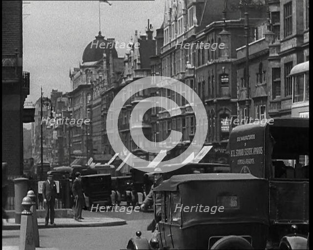 Cars Driving Through London, 1936. Creator: British Pathe Ltd.