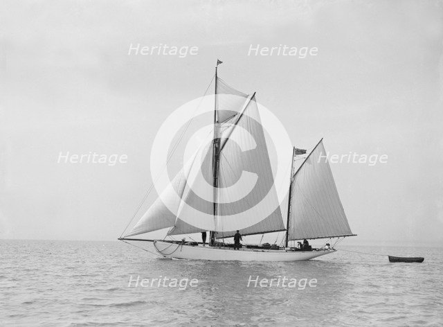 The yawl 'Meander' sailing in fine conditions, 1913. Creator: Kirk & Sons of Cowes.