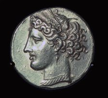 Head of Tanit on a gold tridrachm. Artist: Unknown