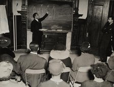 Music class with instructor at the board, 1935 - 1943. Creator: Unknown.