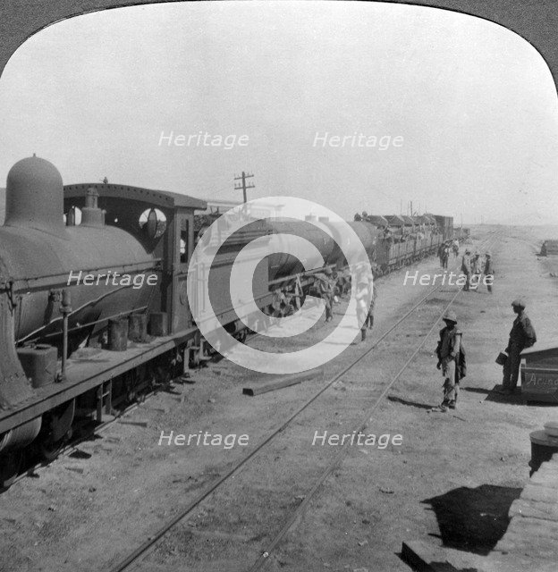 Trainload of armoured cars, South West Africa, World War I, 1914-1918.Artist: Realistic Travels Publishers
