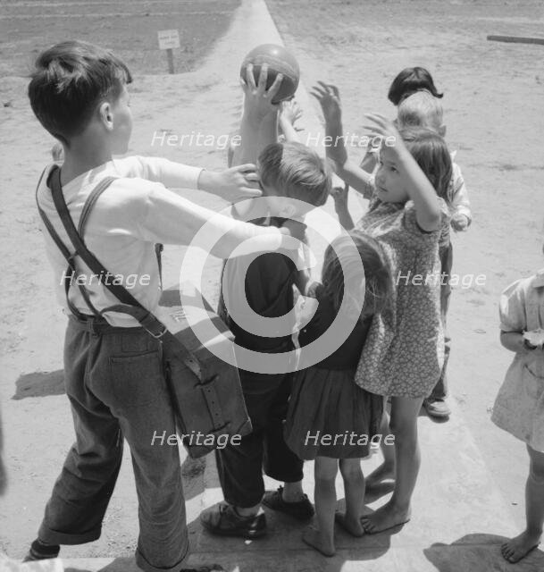 Nursery school, showing migrant children playing, FSA camp, Tulare County, CA , 1939. Creator: Dorothea Lange.
