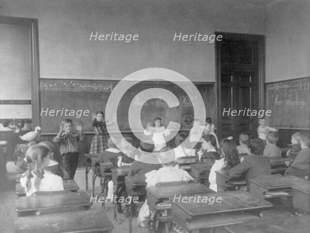 Classroom scene in 1st Division school, Washington, D.C., (1899?). Creator: Frances Benjamin Johnston.