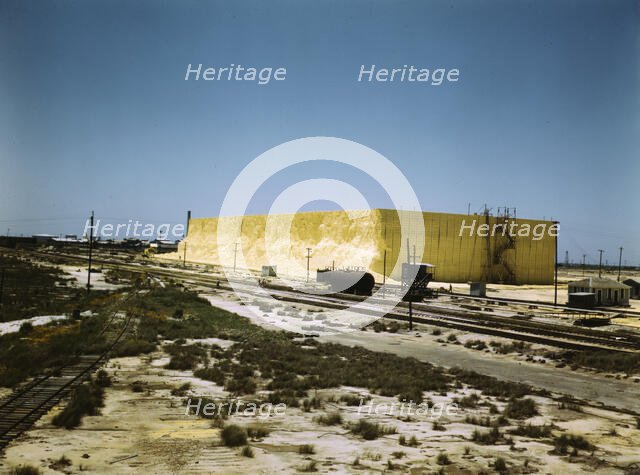 60 foot high sulphur vat, Freeport Sulphur Co., Hoskins Mound, Texas, 1943. Creator: John Vachon.