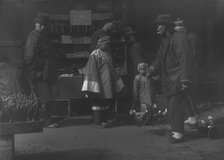 The toy peddler, Chinatown, San Francisco, between 1896 and 1906. Creator: Arnold Genthe.