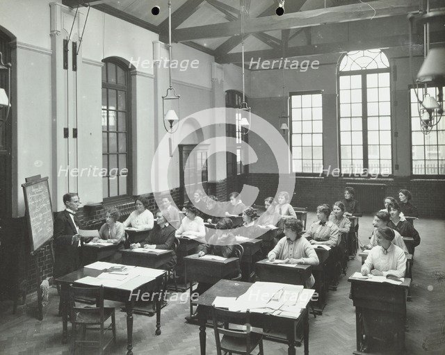 A lesson at the Fulham Girl Clerks' Training School, Fulham, London, 1915. Artist: Unknown.
