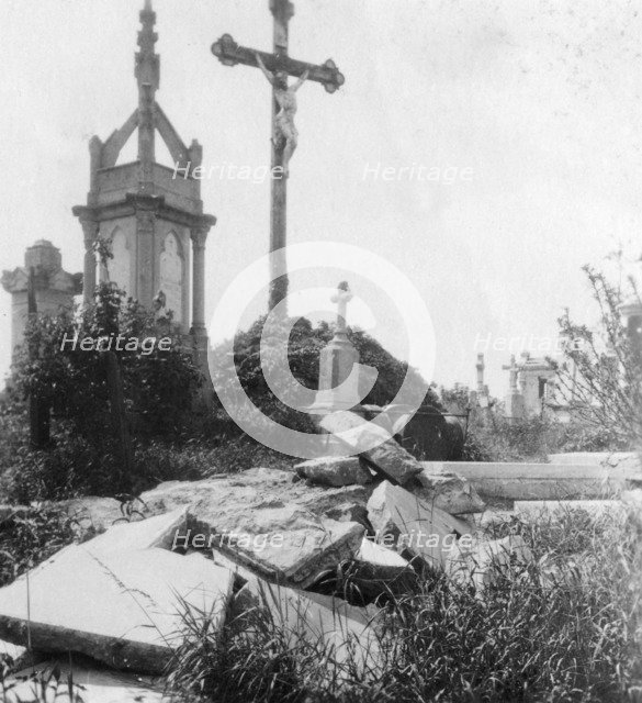 Damaged graves, old communal cemetery, Ypres, Belgium, World War I, c1914-c1918. Artist: Nightingale & Co