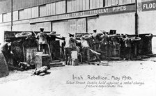 English troops under fire in Talbot Street, Anti-English Irish uprising, Dublin, May 1916. Artist: Unknown