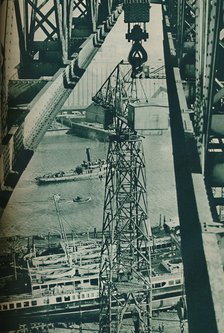 'Seen from a crane, the River Clyde has appearance of a long narrow dock basin', 1937. Artist: Unknown.