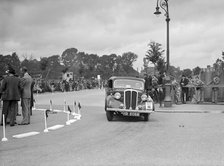 Standard 12 saloon of Miss I Webber competing in the South Wales Auto Club Welsh Rally, 1937 Artist: Bill Brunell.