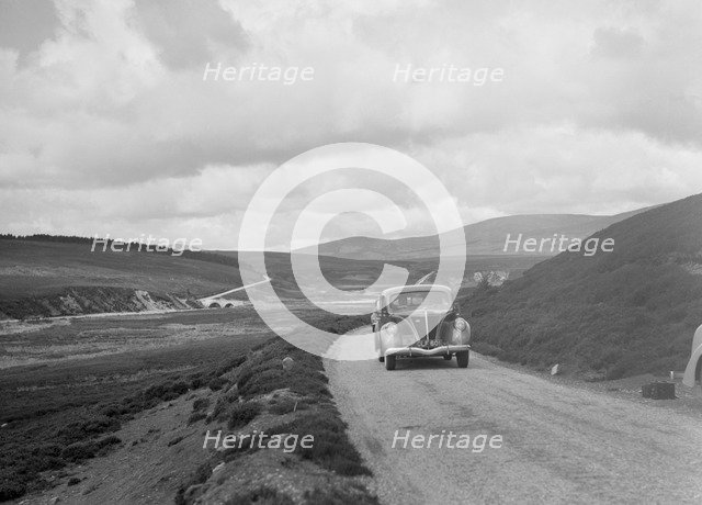 Ford V8 saloon of Joan Chetwynd, RSAC Scottish Rally, 1933. Artist: Bill Brunell.