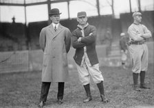 Clark Griffith, right, 1912. Creator: Harris & Ewing.