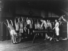 Male students exercising, some with equipment, Western High School, Washington, D.C., (1899?). Creator: Frances Benjamin Johnston.