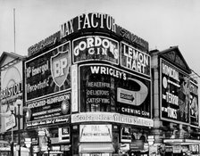 The corner of Piccadilly Circus, Westminster, London, c1961. Artist: Unknown