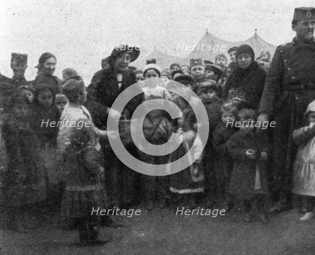 'Aux Camps Serbes (Soldats et refugies civils) de Salonique; Une Belge, elle aussi sans..., 1916. Creator: Hubert Jacques.
