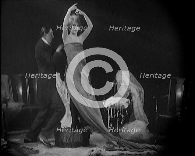 Alphonse Berge, Famous Fashion Designer,  Constructing a Dress, a Female Civilian Model..., 1920. Creator: British Pathe Ltd.