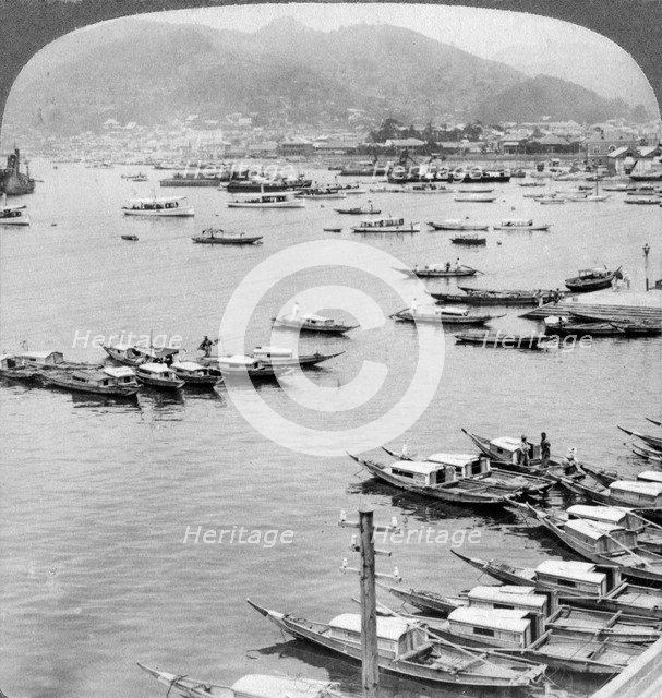 Looking north over vessels in the port of Nagasaki, Japan, 1904.Artist: Underwood & Underwood