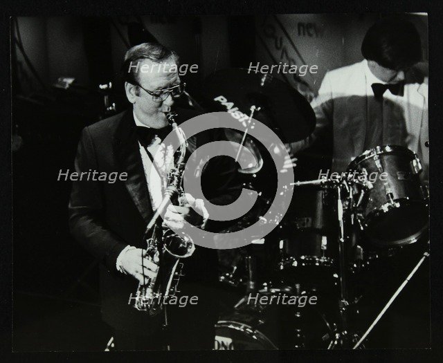 Harry Bence playing the saxophone at the Forum Theatre, Hatfield, Hertfordshire, 1984. Artist: Denis Williams