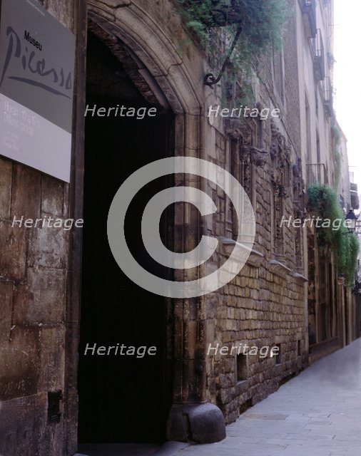 A corner of Montcada street in Barcelona with the Picasso Museum entry.