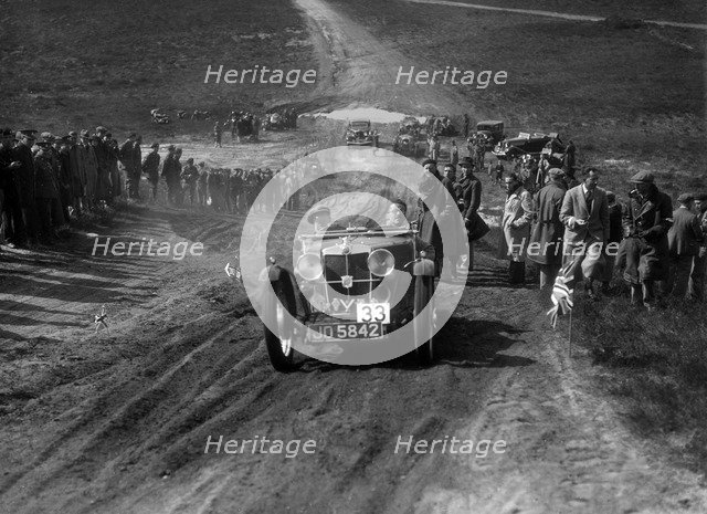 1932 MG J2 competing in a motoring trial, Bagshot Heath, Surrey, 1930s. Artist: Bill Brunell.