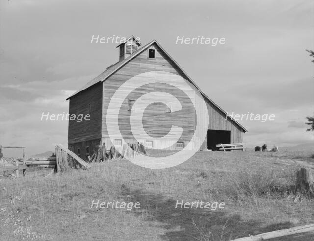The barn of an older settler on established farm, Boundary County, Idaho, 1939. Creator: Dorothea Lange.