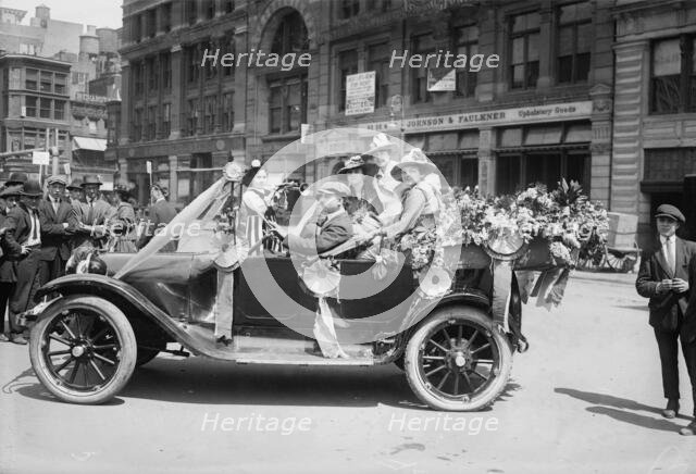 Suffragists selling flowers, (Mrs. Spinack's car), 1916. Creator: Bain News Service.