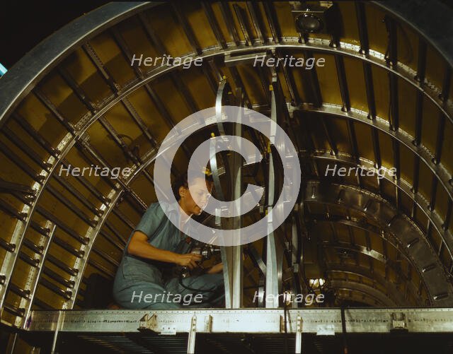 Production of B-24 bombers and C-87 transports, Consolidated Aircraft Corp., Fort Worth, Texas, 1942 Creator: Howard Hollem.