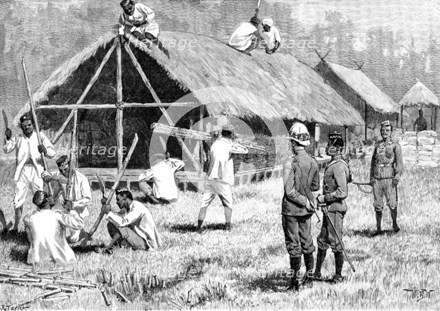 The Lushai Expedition: Goorkhas building a hut to store their spare kit, 1890. Creator: R. Taylor.
