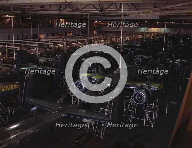 View of the B-25 final assembly line at North American Aviation's Inglewood, California, plant, 1942 Creator: Alfred T Palmer.