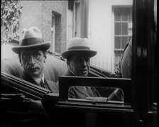 President of the Irish Republic Eamon De Valera Getting Into a Motorcar With a British Man..., 1921. Creator: British Pathe Ltd.