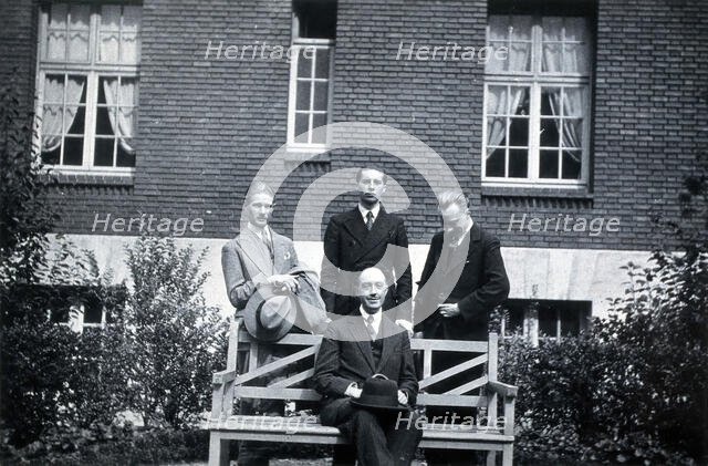 A George, L Destoucher, R Valletto and de Broglie, in front of the Institut Henri Poincaré, 1933. Creator: Unknown.