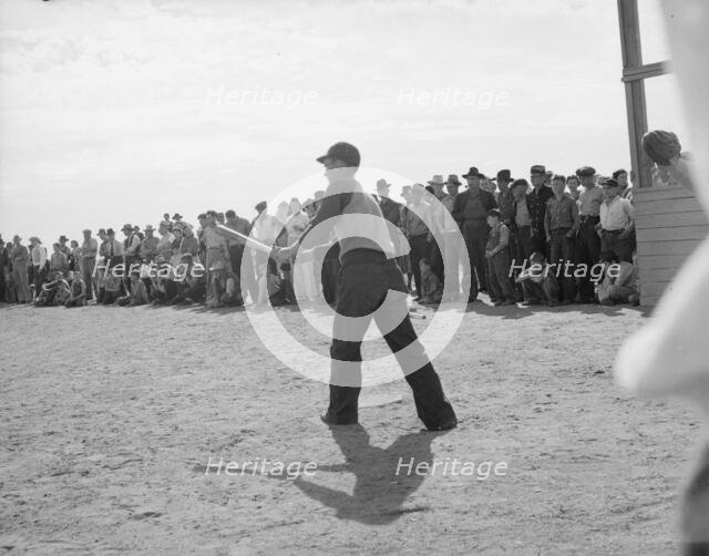 Ball game, Shafter migrant camp, California, 1938. Creator: Dorothea Lange.