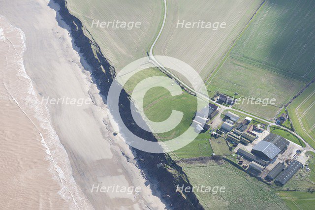 Coastal erosion at Low Farm, Aldbrough Sands, East Riding of Yorkshire, 2014. Creator: Historic England Staff Photographer.