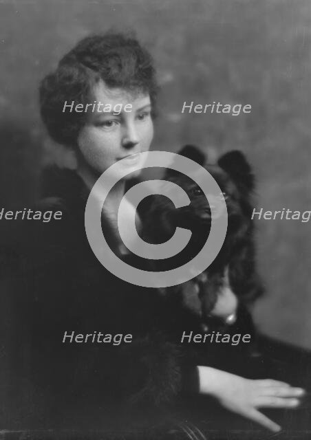 Hartshorne, Miss, with dog, portrait photograph, 1917 May 15. Creator: Arnold Genthe.