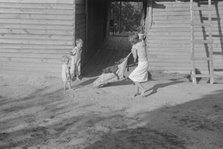 Burroughs children playing in the yard, Hale County, Alabama, 1936. Creator: Walker Evans.