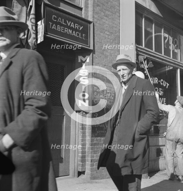 Howard Street, called "Skid Row," the street of the unemployed in San Francisco, California, 1937. Creator: Dorothea Lange.