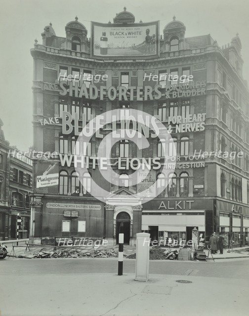 Advertisements at Cambridge Circus, Westminster, London, 1945. Artist: Unknown.