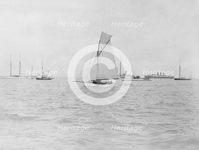 The gaff cutter 'Wigeon' under sail, 1910. Creator: Kirk & Sons of Cowes.