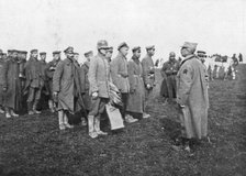 German prisoners taken on 18 April 1918 being told the rules of their captivity, France. Artist: Unknown