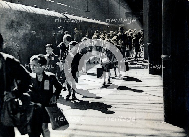 London schoolchildren being evacuated, Euston Station, World War II, 6 July 1944. Artist: Unknown