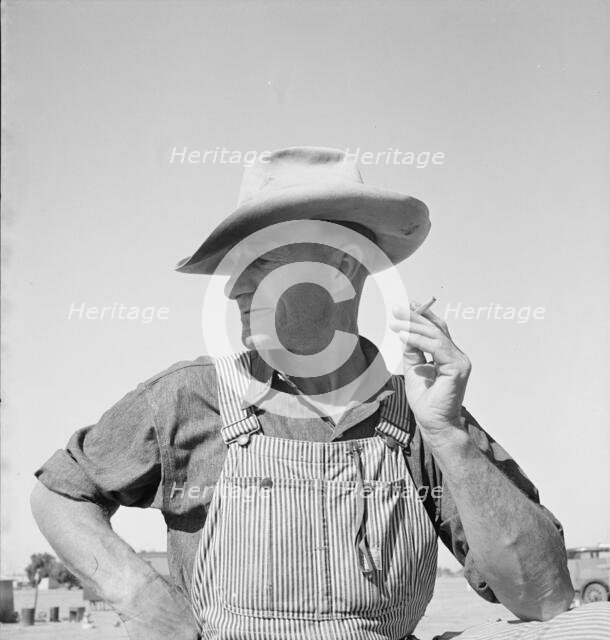 Nebraska farmer come to pick peas, near Calipatria, California, 1939. Creator: Dorothea Lange.