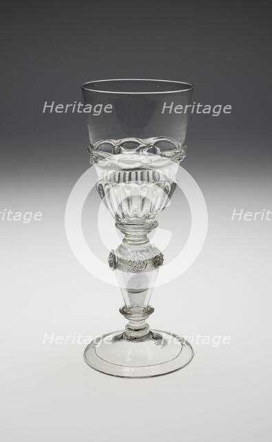 Wineglass Containing Two Uncirculated Charles II Silver Coins Dated 1670 and 1671, , c. 1690-1710. Creator: Unknown.