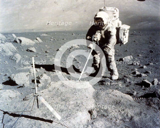Harrison Schmitt works the scoop on the lunar surface, Apollo 17 mission, December 1972. Creator: NASA.