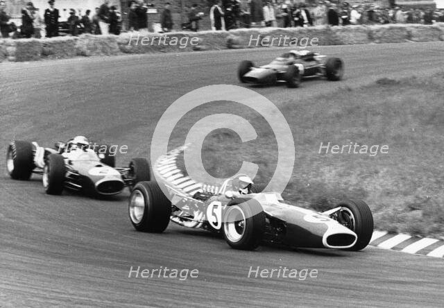 Jim Clark driving his Lotus 49 R3 DFV at the Dutch Grand Prix, Zandvoort, Netherlands, 1967. Creator: Unknown.