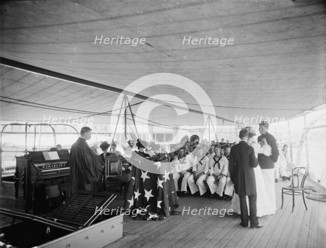 U.S.S. Texas, presentation of cross and badge to Ensign Gherardi by the King's..., Aug. 8, 1897. Creator: Unknown.
